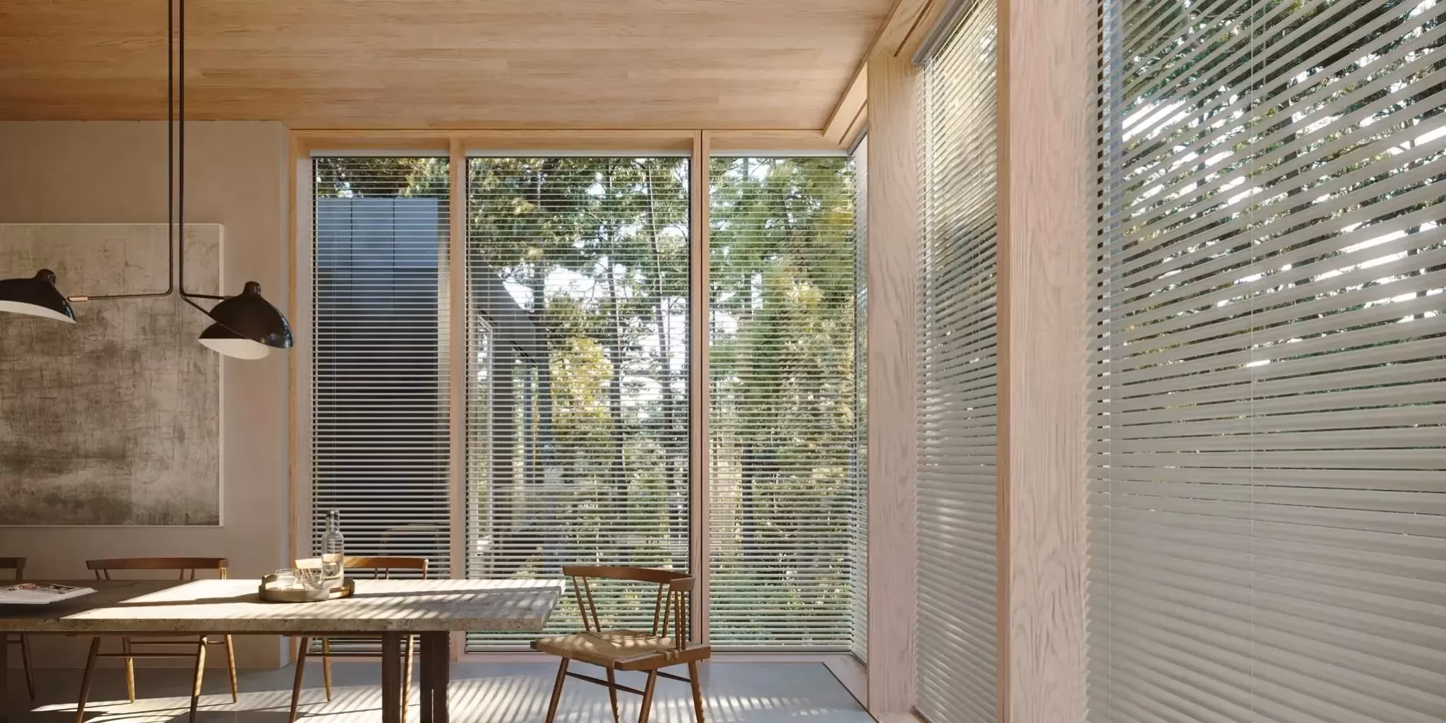La Grange Window Coverings custom Scandinavian-inspired wood blinds with basswood slats and Ultraglide retractable cord system in a Sonoma County dining room, Windsor CA 95492